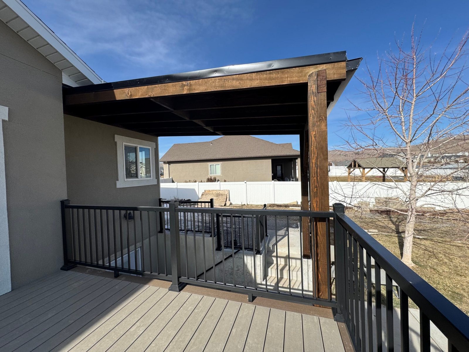 Covered deck railing detail by Utah County Decks
